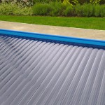 Solar pool cover slats